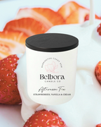 Belbora Candle Co Afternoon Tea candle with strawberries and cream in the background