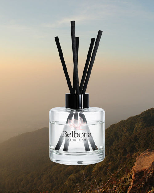 Belbora candle co barrington tops reed diffuser against a mountainous background