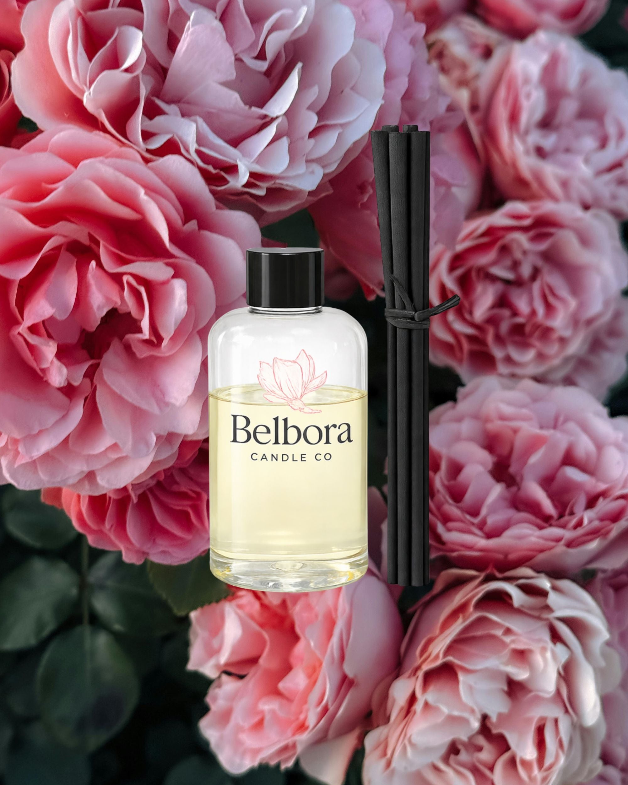 Belbora Candle Co Country Home Reed Diffuser Refill on a background of pink flowers